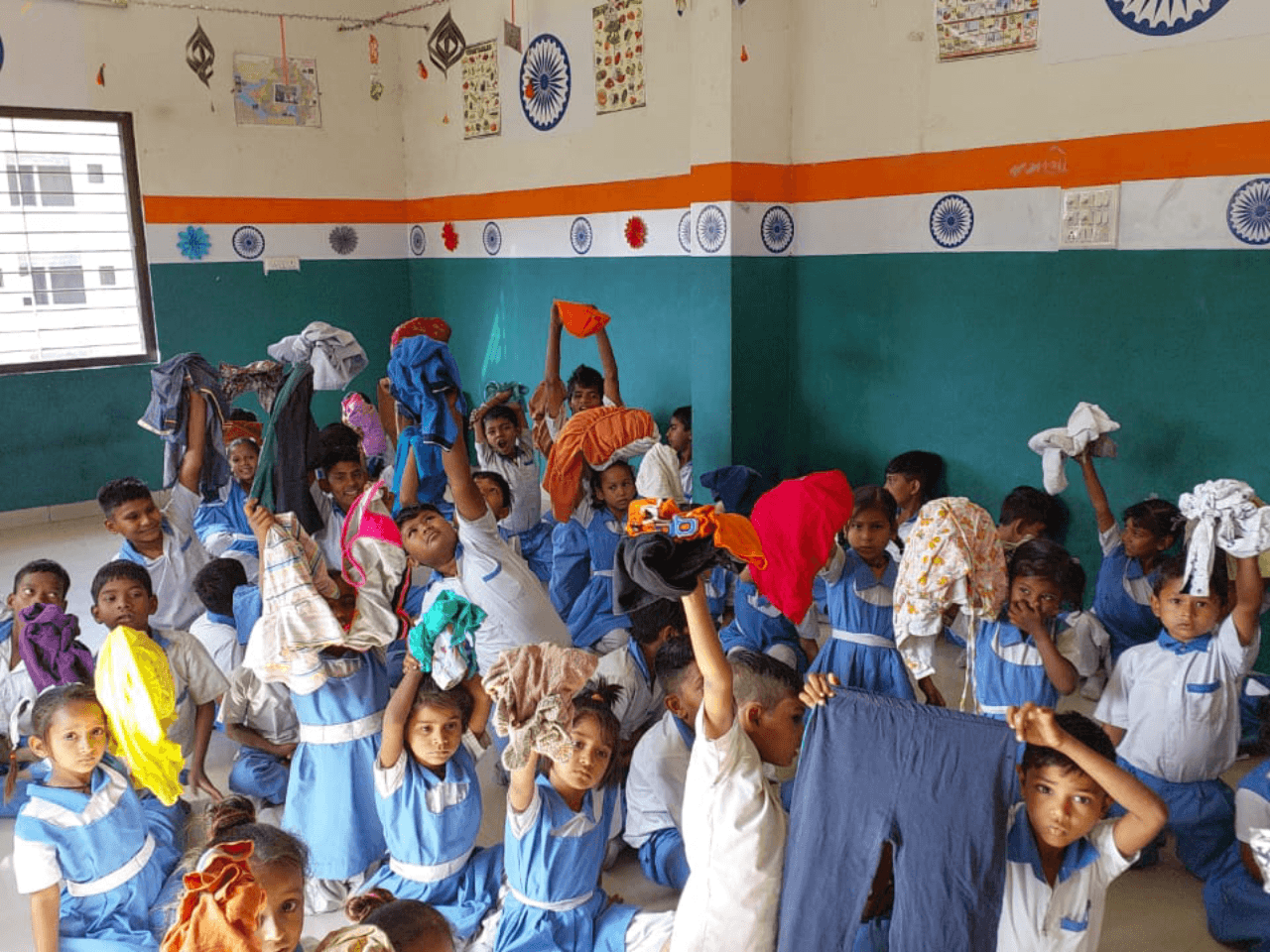 Children playing with colours during Holi celebrations