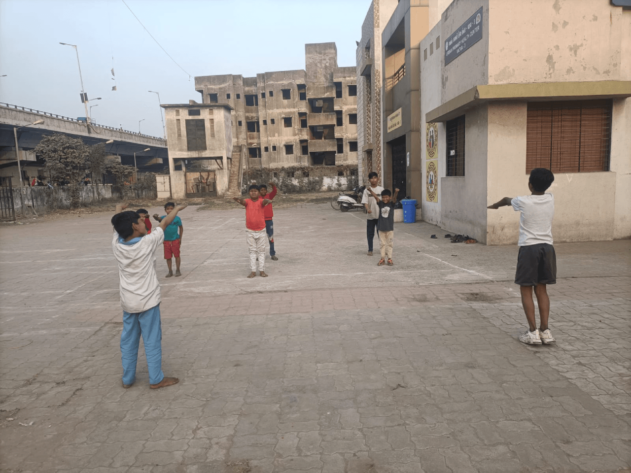 Children practicing karate as part of enrichment coaching